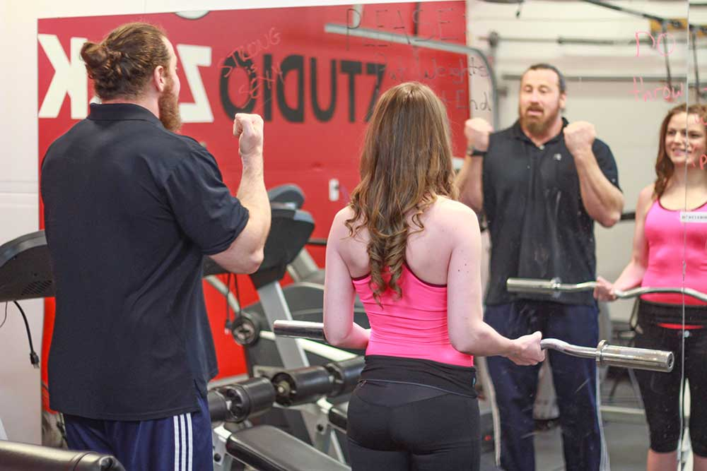 Ryan coaching a semi-private strength session